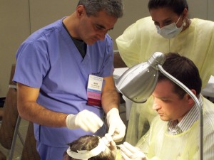 Parsa Mohebi, MD Performs a Surgery With Medical Technicians